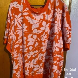 Orange and pink floral shirt sleeve sweater.